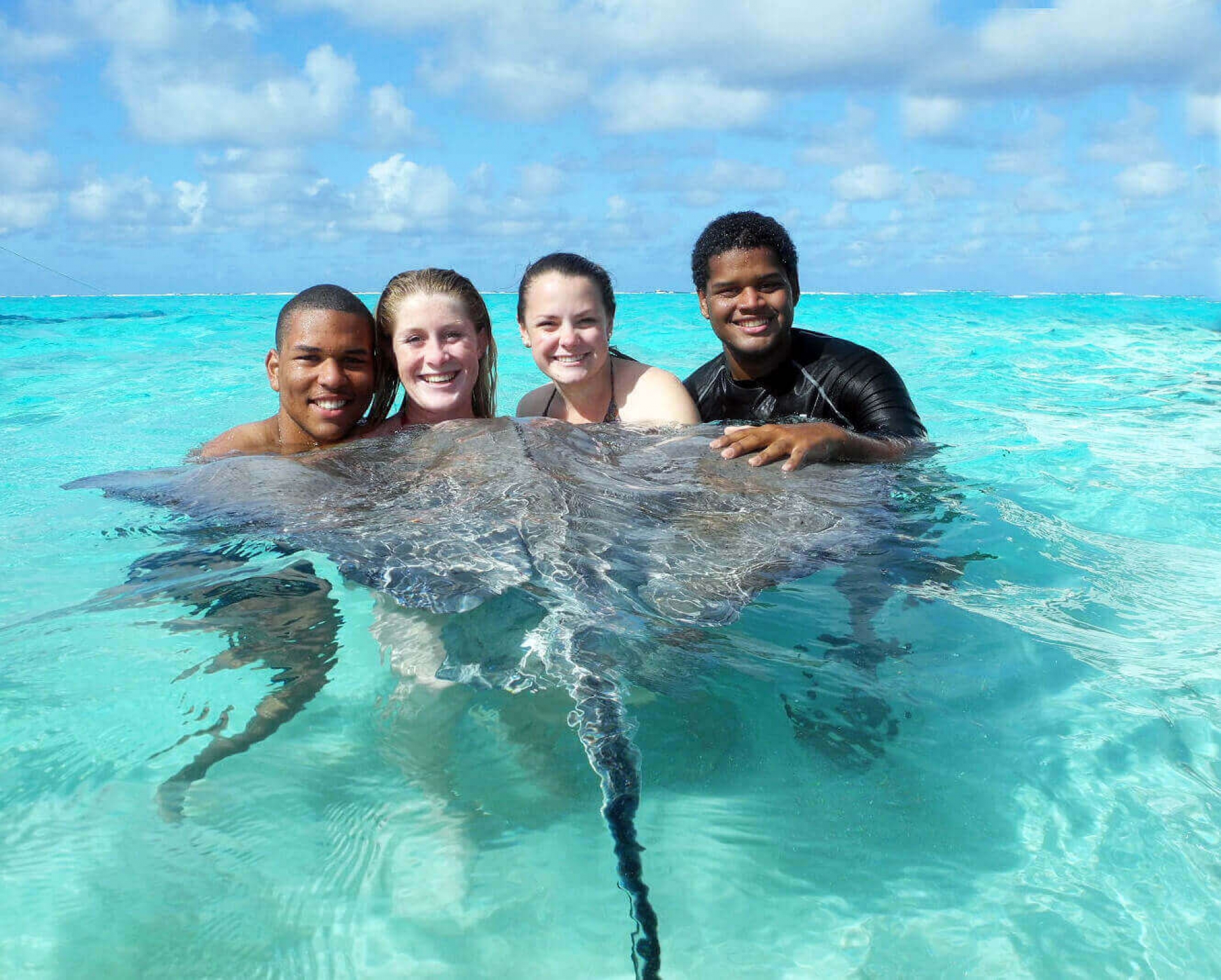 http://jt-rebuild.corals.io/media/Va8K7DpmRJ/122/People-swimming-with-stingray.jpg